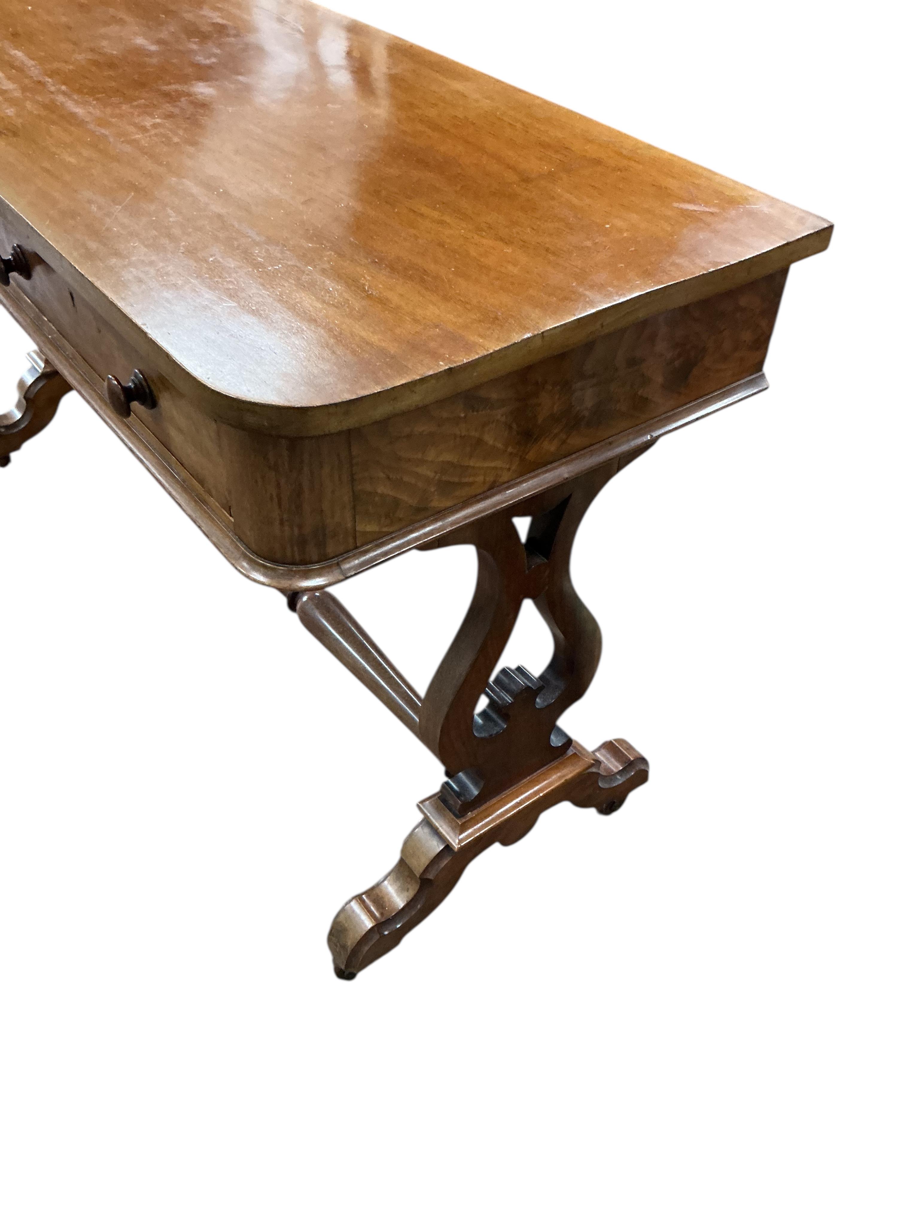 A Victorian mahogany two drawer side table, width 122cm, depth 51cm, height 75cm